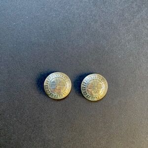 A pair of silver Kaibab boot buckles.